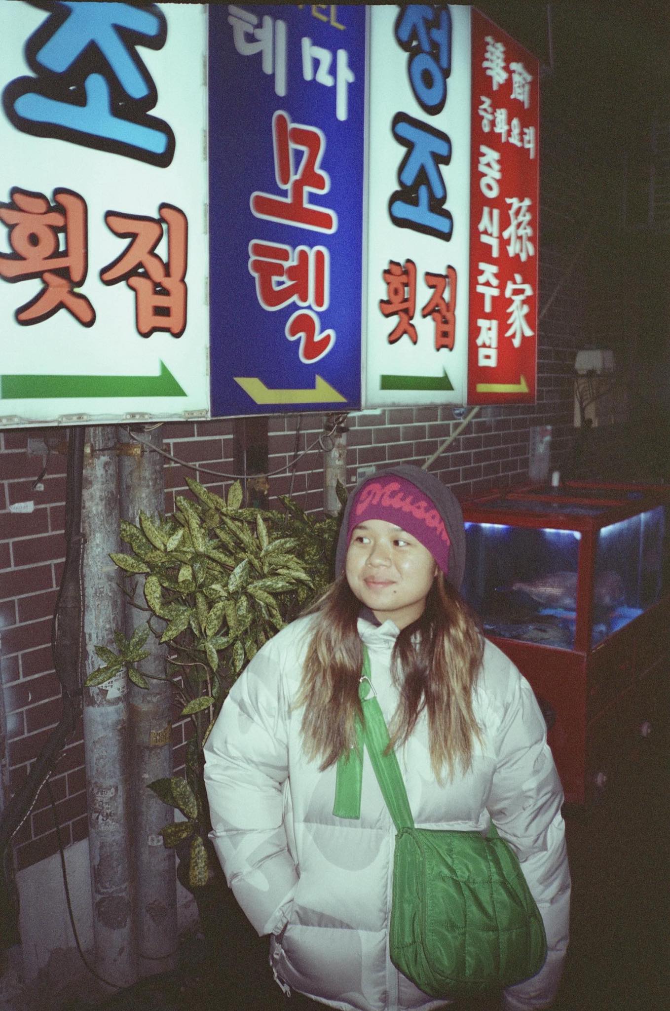 Musoka purple and pink beanie worn by a model