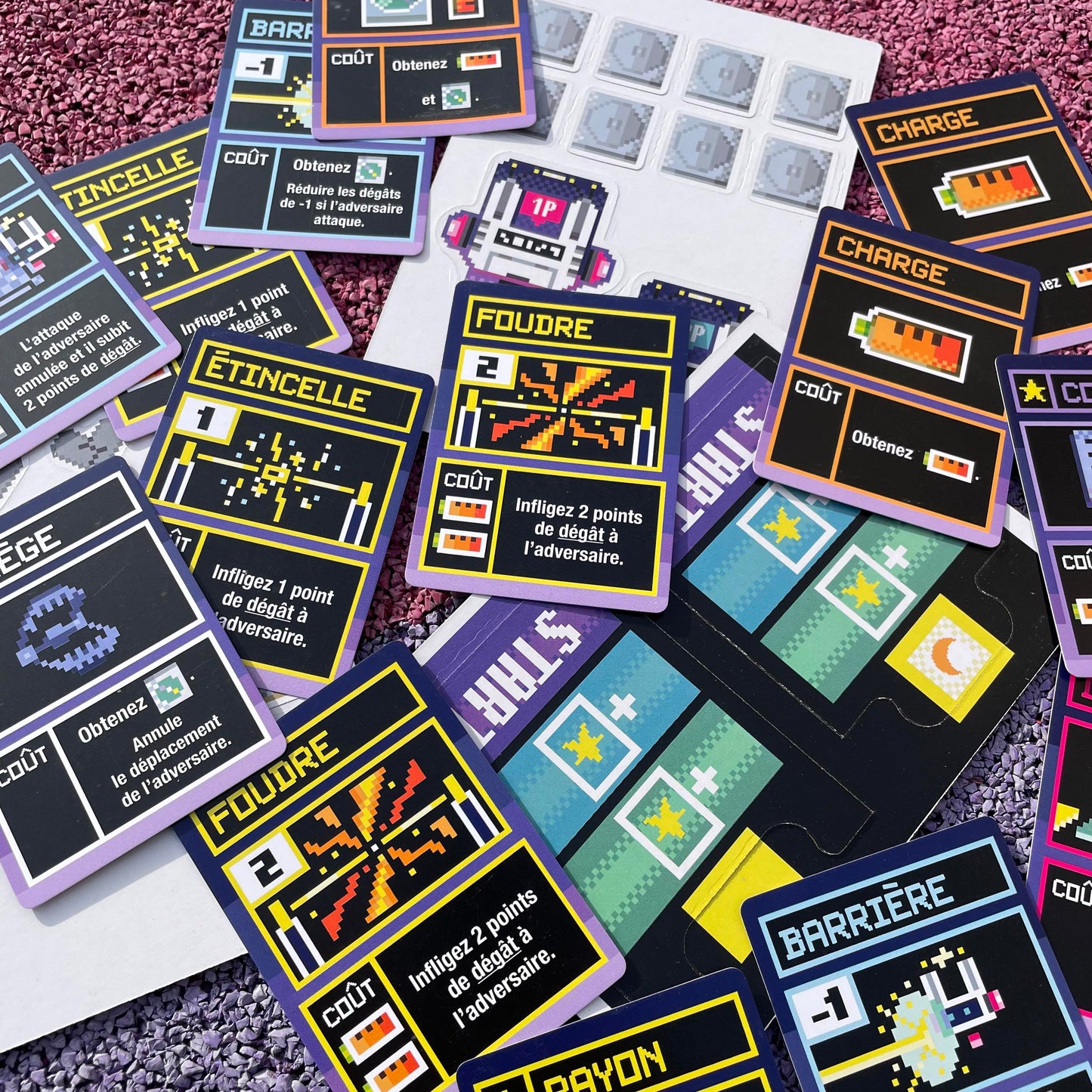 Close-up of Charge & Spark pixel-art robot illustrations