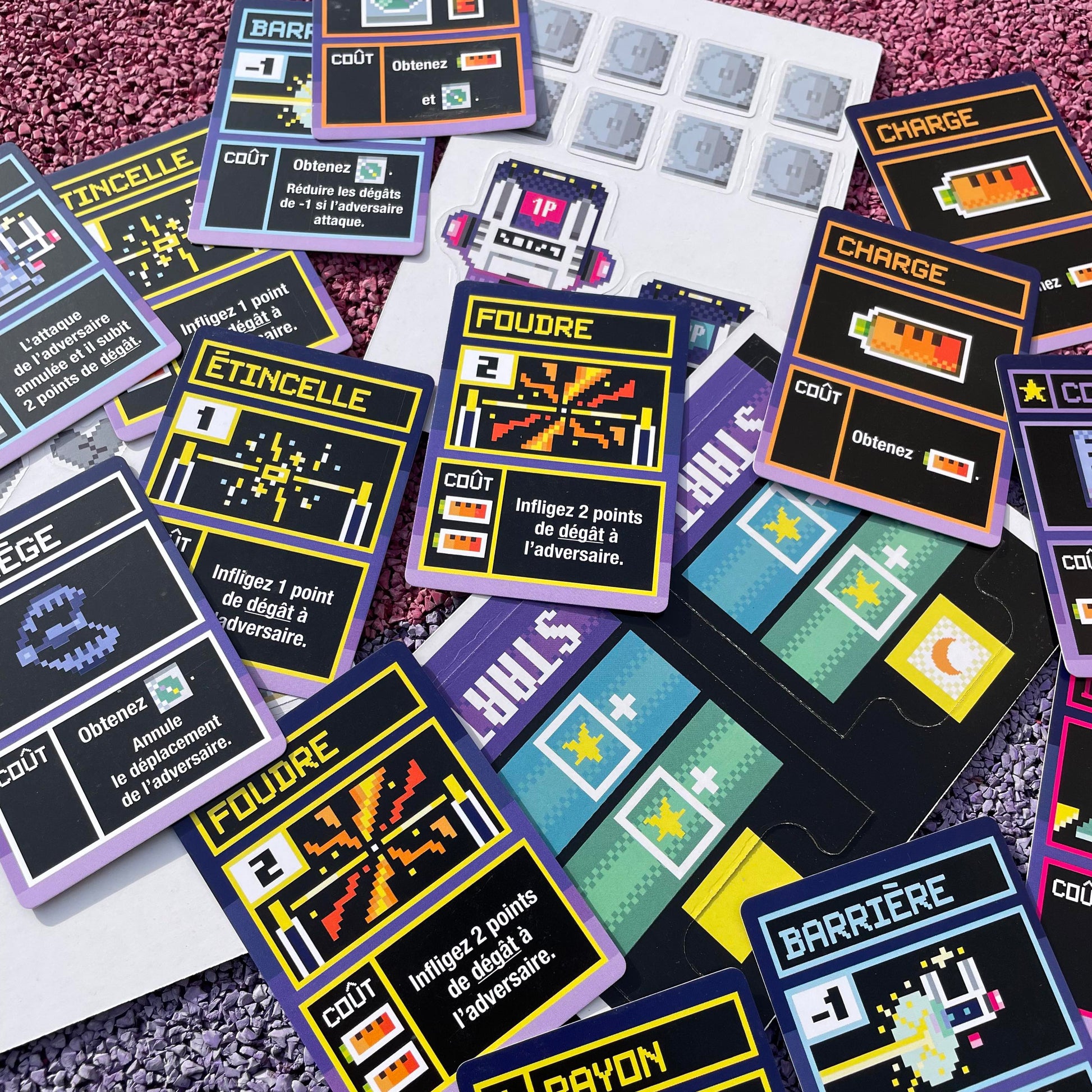 Close-up of Charge & Spark pixel-art robot illustrations