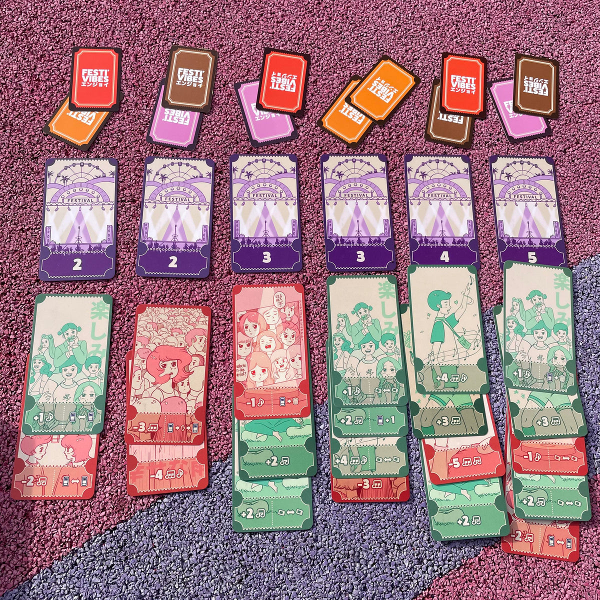 Festi'vibes box contents: cards and festival tokens