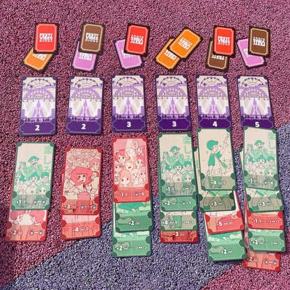 Festi'vibes box contents: cards and festival tokens