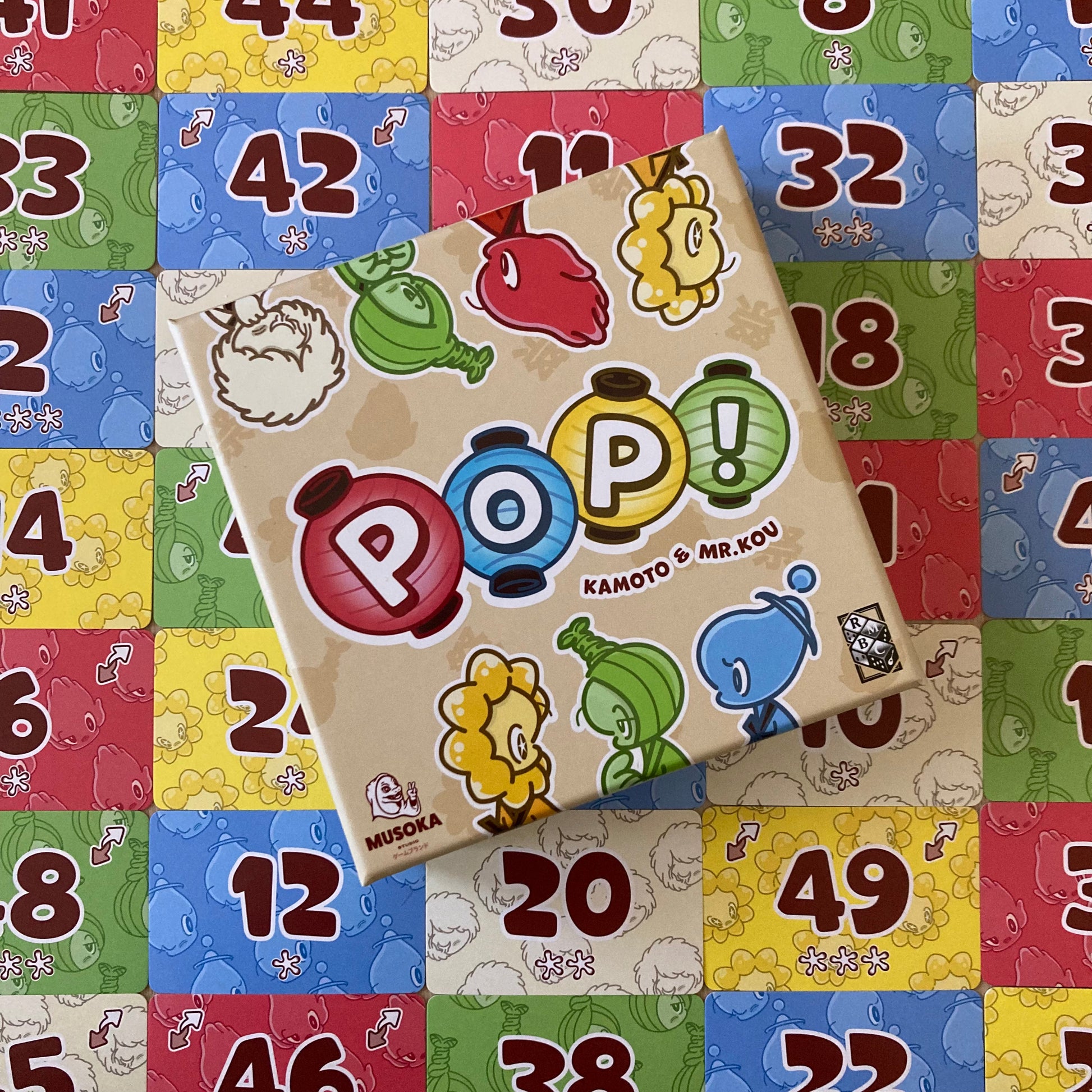 POP! cards placed in a line during a game