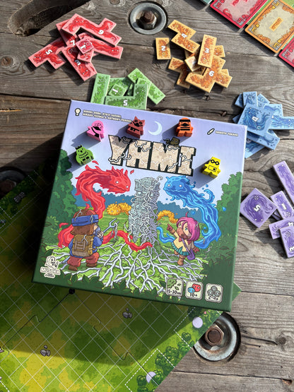Yami game board with polyomino tiles and Lyken vines spreading