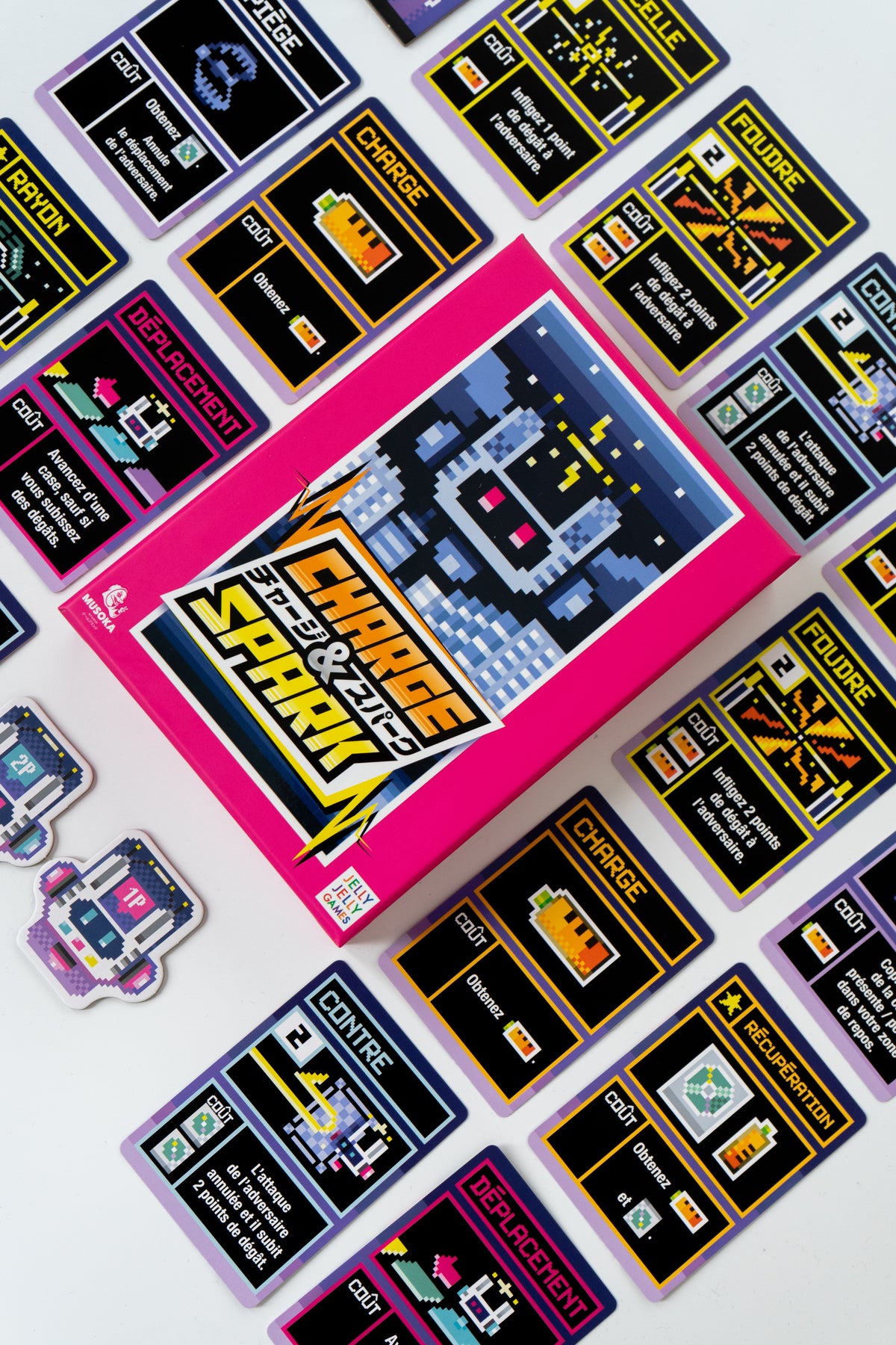 Charge & Spark two-player game set up on a table
