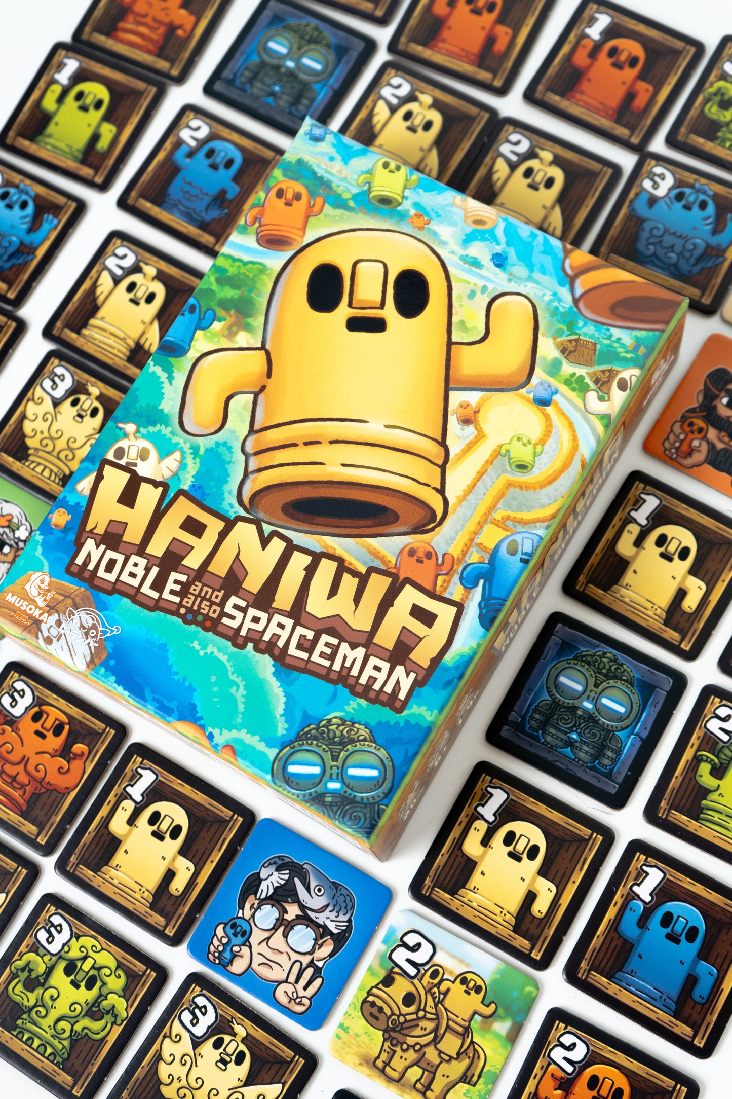 Close-up of Haniwa statue tiles being placed on the scoring grid