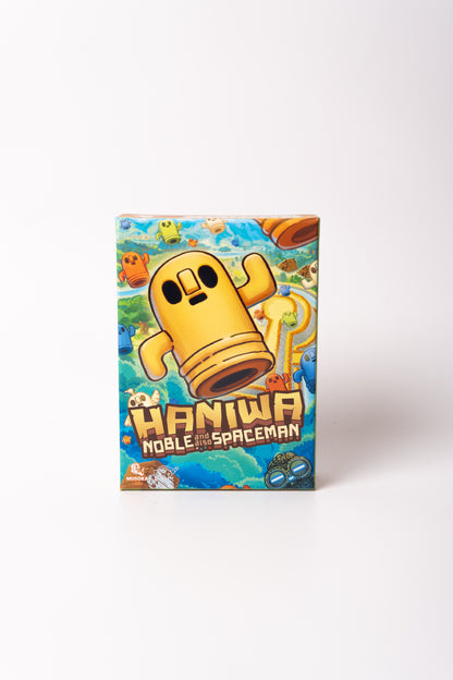 Haniwa game set up on a table with tiles and dice during a 2-player match
