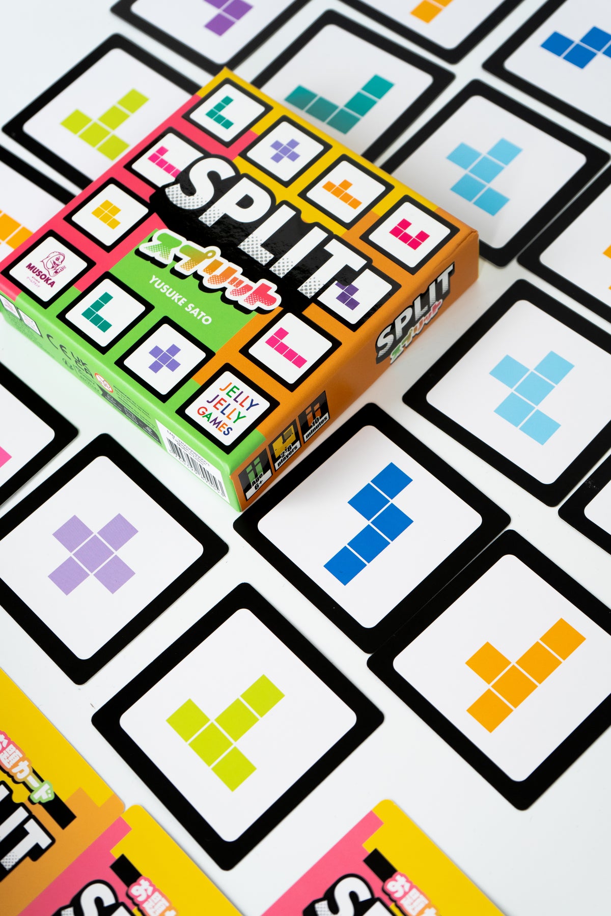 SPLIT model card and puzzle cards laid out on a table